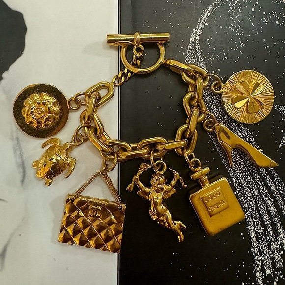 CHANEL Jewelry - Chanel Vintage Gold Lucky Icons Charm Bracelet